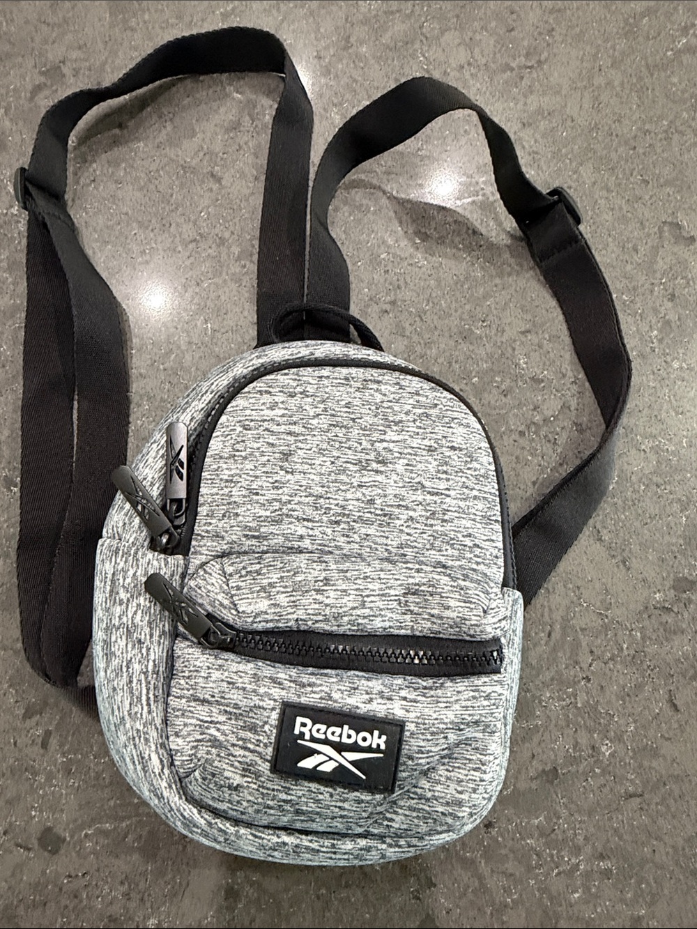 Reebok kids/women’s Heather Gray Mini Backpack with Black Strap